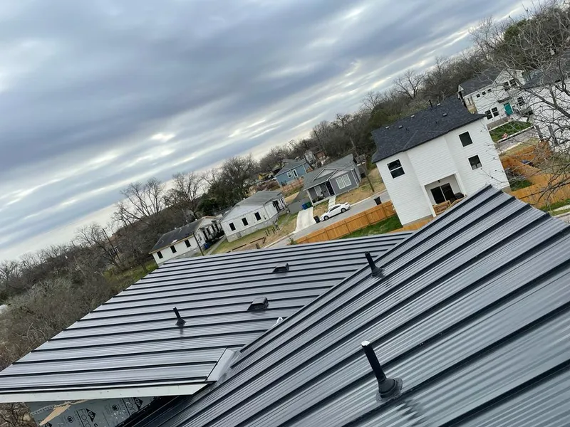 Standing seam metal roof panels with vents for Skylight Repair in Brownville